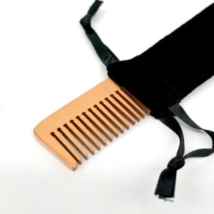 peine de cobre con estuche